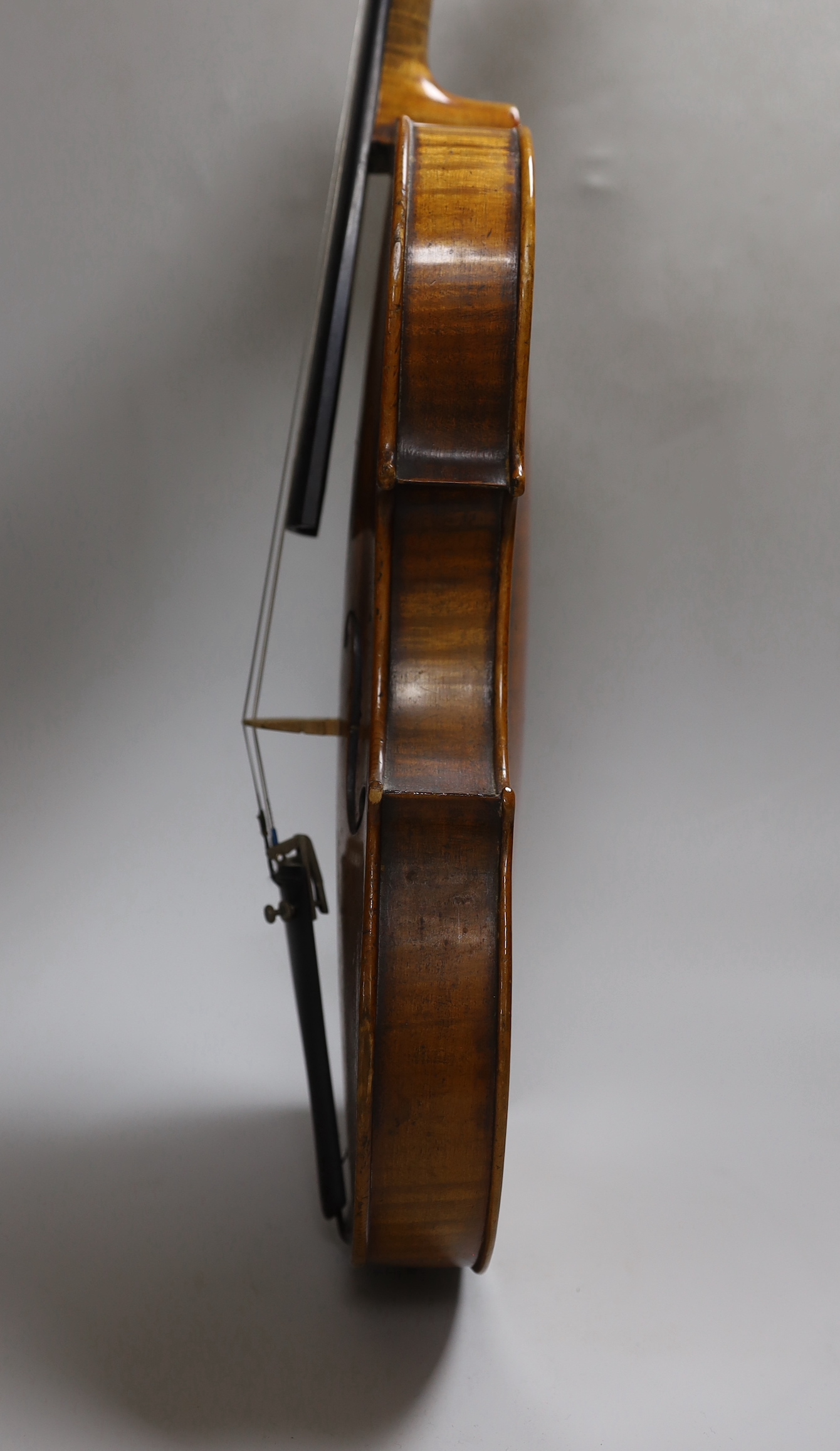 A Vuillaume violin with a bow, in case, back measures 36cm excl button